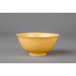 A Chinese yellow ground bowl with incised underglaze design, Yongzheng mark, 19th/20th C.