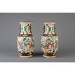 A pair of Chinese Nanking famille rose crackle glazed vases, 19th C.