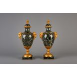 A pair of Neoclassical gilt bronze mounted Vert de mer marble cassolettes, 19th/20th C.