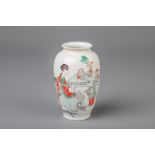 A Chinese famille verte vase with a lady and two children, 19th C.