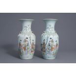 A pair of Chinese famille rose vases with ladies in a garden, 19th/20th C.