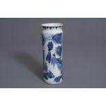 A Japanese blue and white sleeve vase with figures in a landscape, Edo, 17th/18th C.