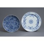 Two large Chinese blue & white chargers w. floral design, Kangxi and Qianlong