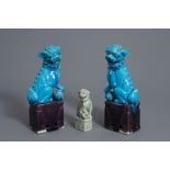 A pair of Chinese turquoise glazed models of Buddhist lions and one in celadon, 19th/20th C.