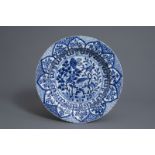 A lobed Chinese blue and white charger with floral design, Kangxi