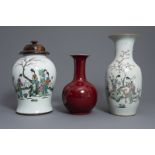 Two Chinese famille rose vases and a red ground vase, 19th/20th C. and 20th C.