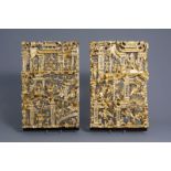 A pair of Chinese gilded reticulated carved wood panels, 19th/20th C.