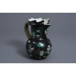 A Chinese famille noire jug with antiquities design, Kangxi mark, 19th C.