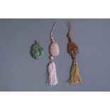 Three Chinese pink quartz, jade and agate pendants, 19th/20th C.