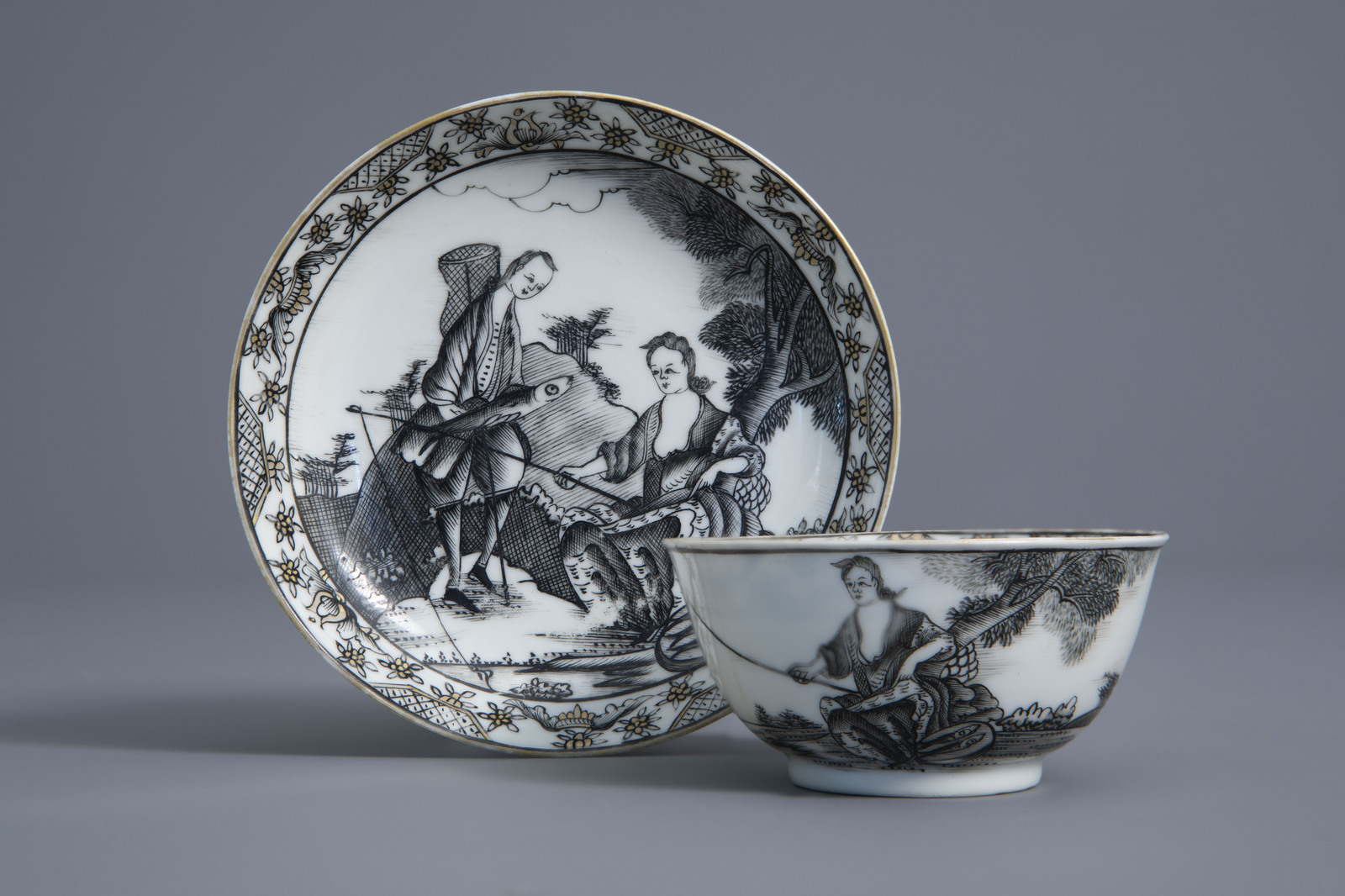 A Chinese grisaille export cup and saucer with allegorical 'Agua' design, Qianlong