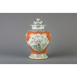 A Chinese famille rose vase and cover with floral design, 19th C.