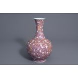 A Chinese famille rose red-pink ground bottle vase, Qianlong mark, 19th/20th C.