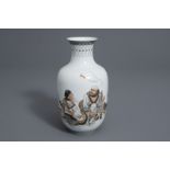 A Chinese grisaille and iron red vase with figures, 20th C.