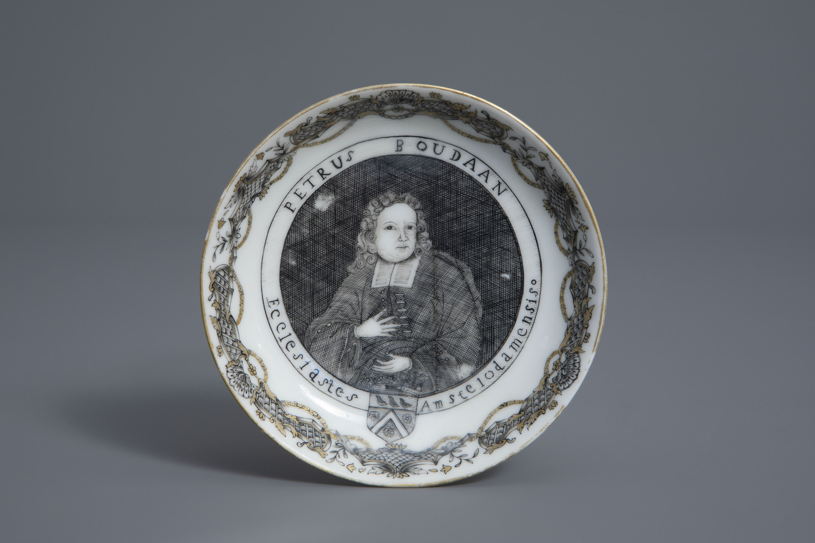 A Chinese grisaille export saucer with the portrait of Petrus Boudaan, Qianlong