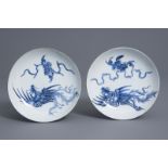 A pair of Chinese blue & white Vietnamese market 'Bleu de Hue' phoenixes plates, 19th C.