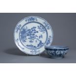 A large Chinese blue & white dish & a bowl w. figures in a landscape, Qianlong