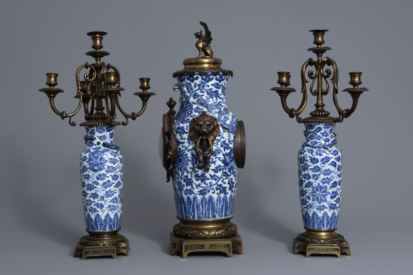 A Chinese three-piece bronze mounted blue and white porcelain garniture, 19th C. - Image 5 of 10