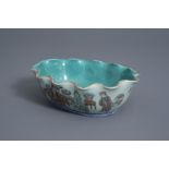 A lobed Chinese famille rose celadon ground bowl, Tongzhi mark, 19th C.