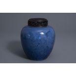 A Chinese blue ground ginger jar with two qilins, 19th/20th C.