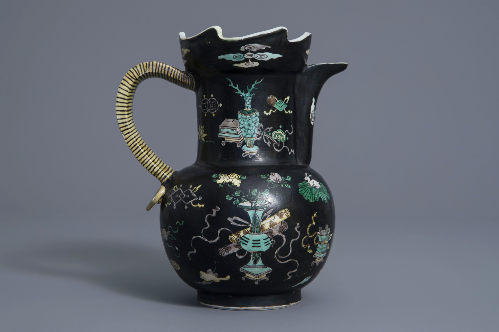 A Chinese famille noire jug with antiquities design, Kangxi mark, 19th C. - Image 6 of 7