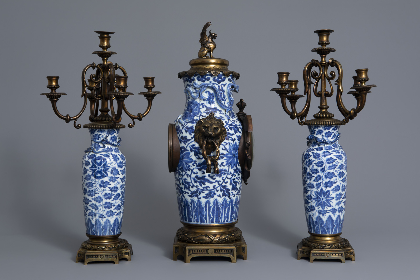 A Chinese three-piece bronze mounted blue and white porcelain garniture, 19th C. - Image 3 of 10