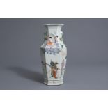 A Chinese famille rose hexagonal vase with a warrior and an immortal, 19th C.