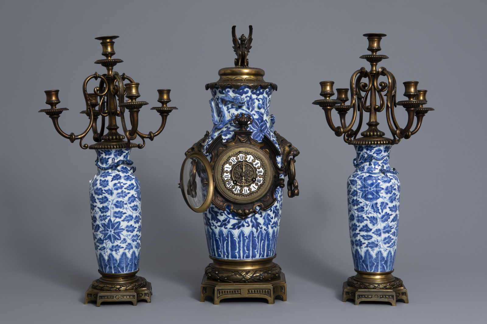 A Chinese three-piece bronze mounted blue and white porcelain garniture, 19th C. - Image 2 of 10