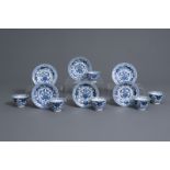 Six Chinese blue and white cups and saucers with floral design, Kangxi mark, 19th C.