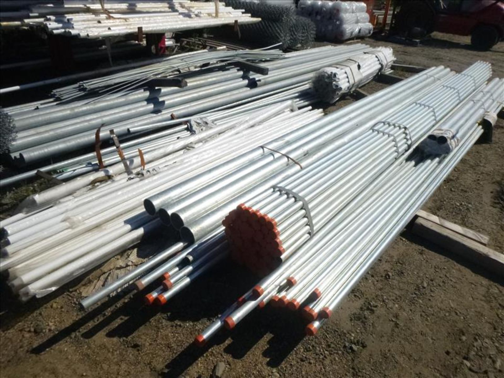 large quantity of misc. fencing materials; fencing, poles, hardware, inserts, wire, etc. ( - Image 5 of 19