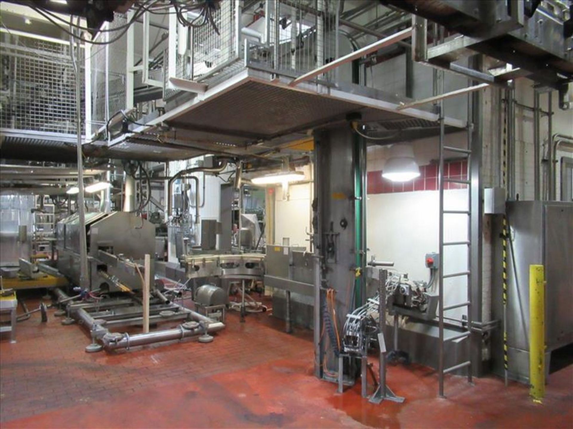 Canners Machinery Ltd mag elevator stainless clad column with 4 in wide conveyor belt, approx on 6-