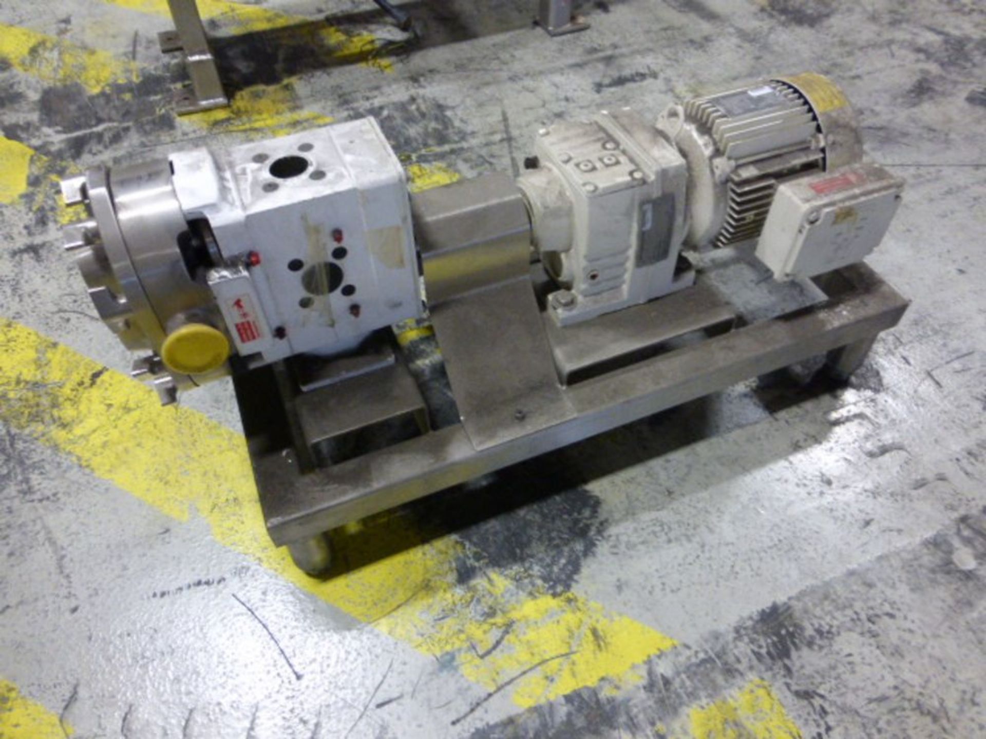 Waukesha 1.5 in stainless positive displacement pump, model 0300, ser. no A2345N, with 1.5 hp motor,