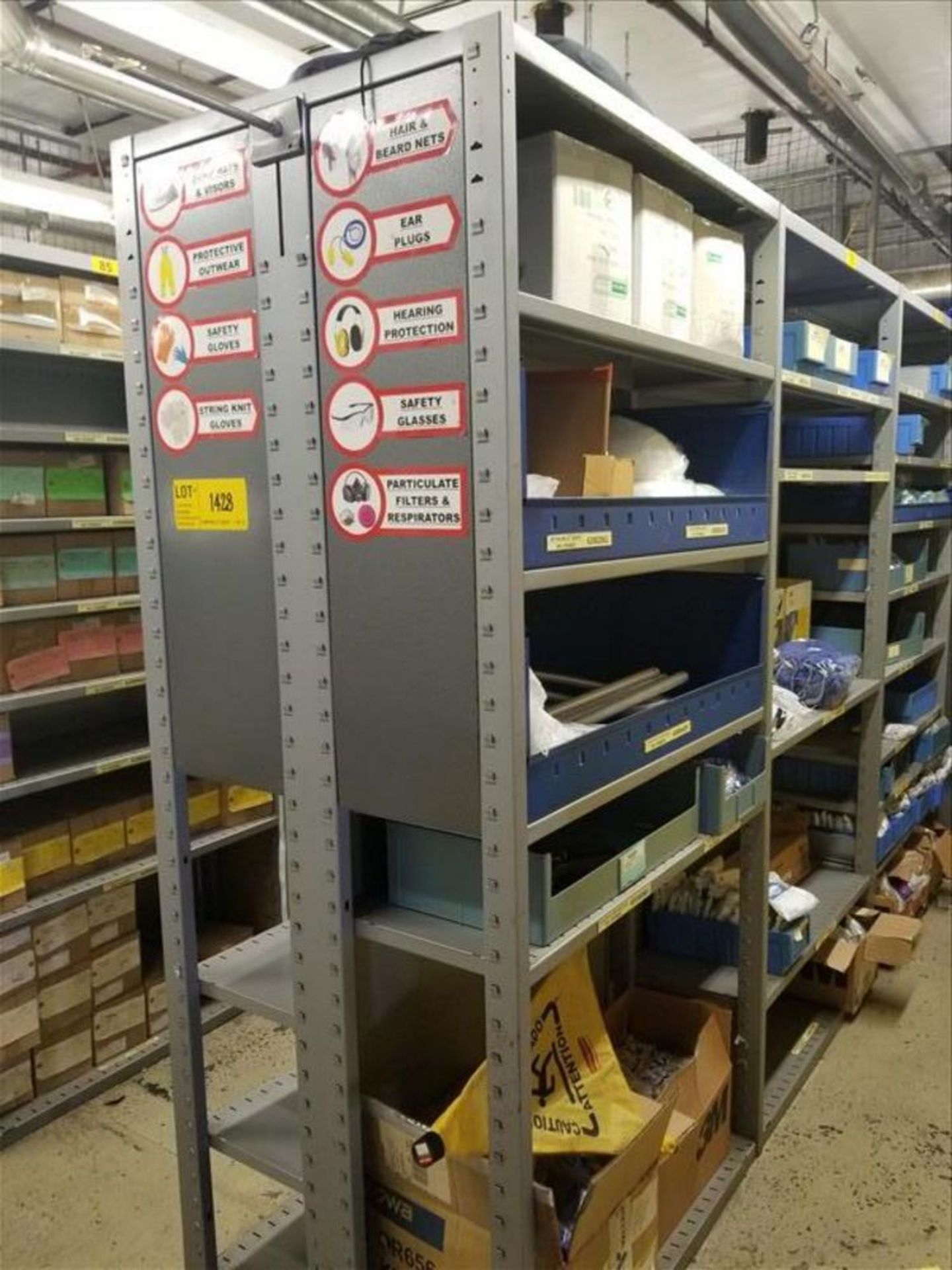 (24) Section Metal Shelving with Contents: Gloves, Ear Plugs, Filters, Safety Glass, Beard Guards,