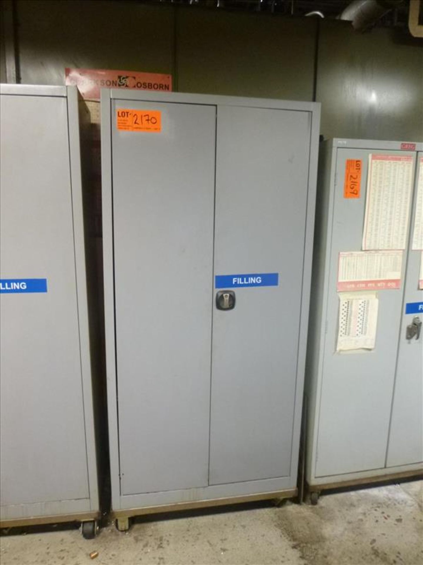 2-door cabinet c/w s/s stand on casters c/w contents [Machine Shop, 1st Floor]