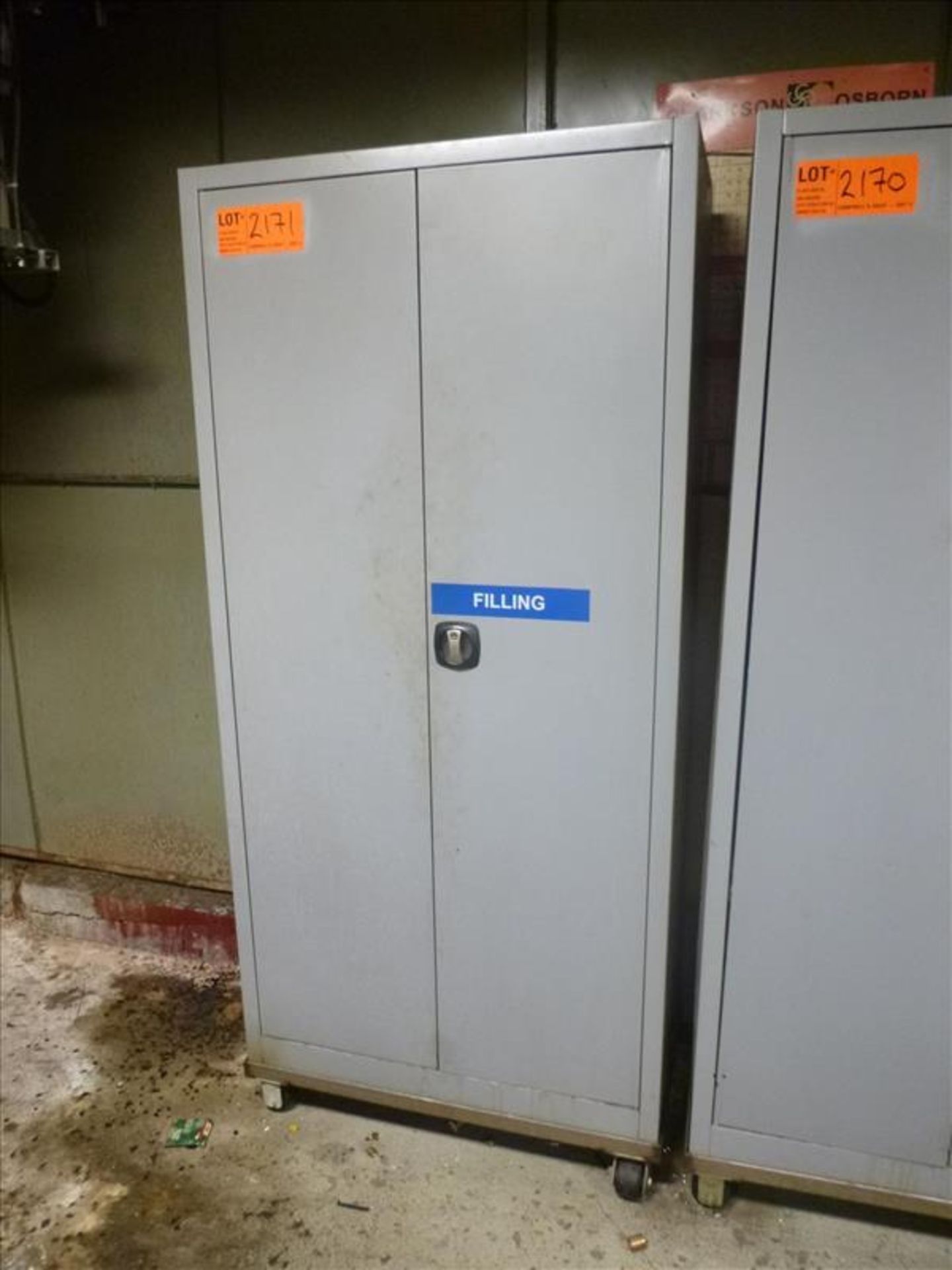 2-door cabinet c/w s/s stand on casters c/w contents [Machine Shop, 1st Floor]