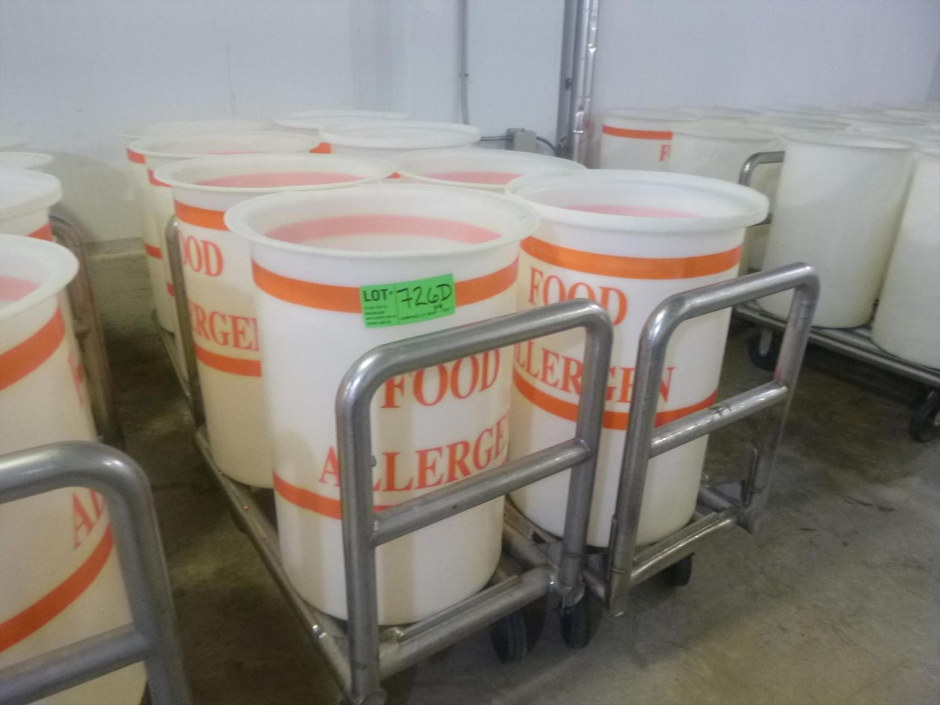 (8) poly drums, 36 in. H x 22 in. dia. c/w (4) heavy duty s/s carts [2nd Floor, Freezer]