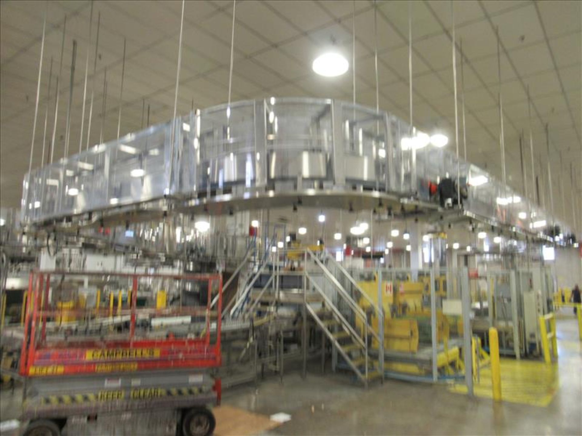 Overhead case conveyor approx 120 to 150 ft. long, extending to palletizing stations, stainless