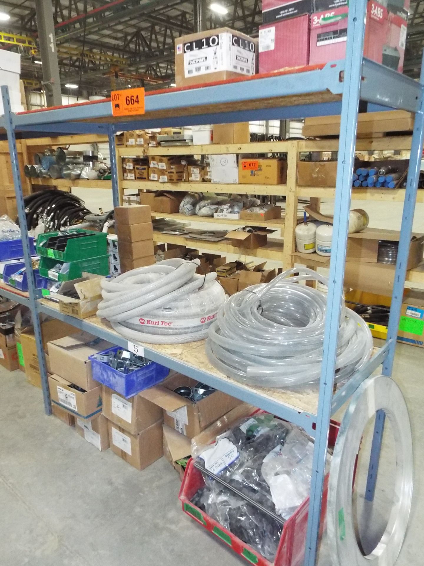 LOT/ SHELF AND CONTENTS - CLEAR PVC HOSE AND PLUMBING SUPPLIES