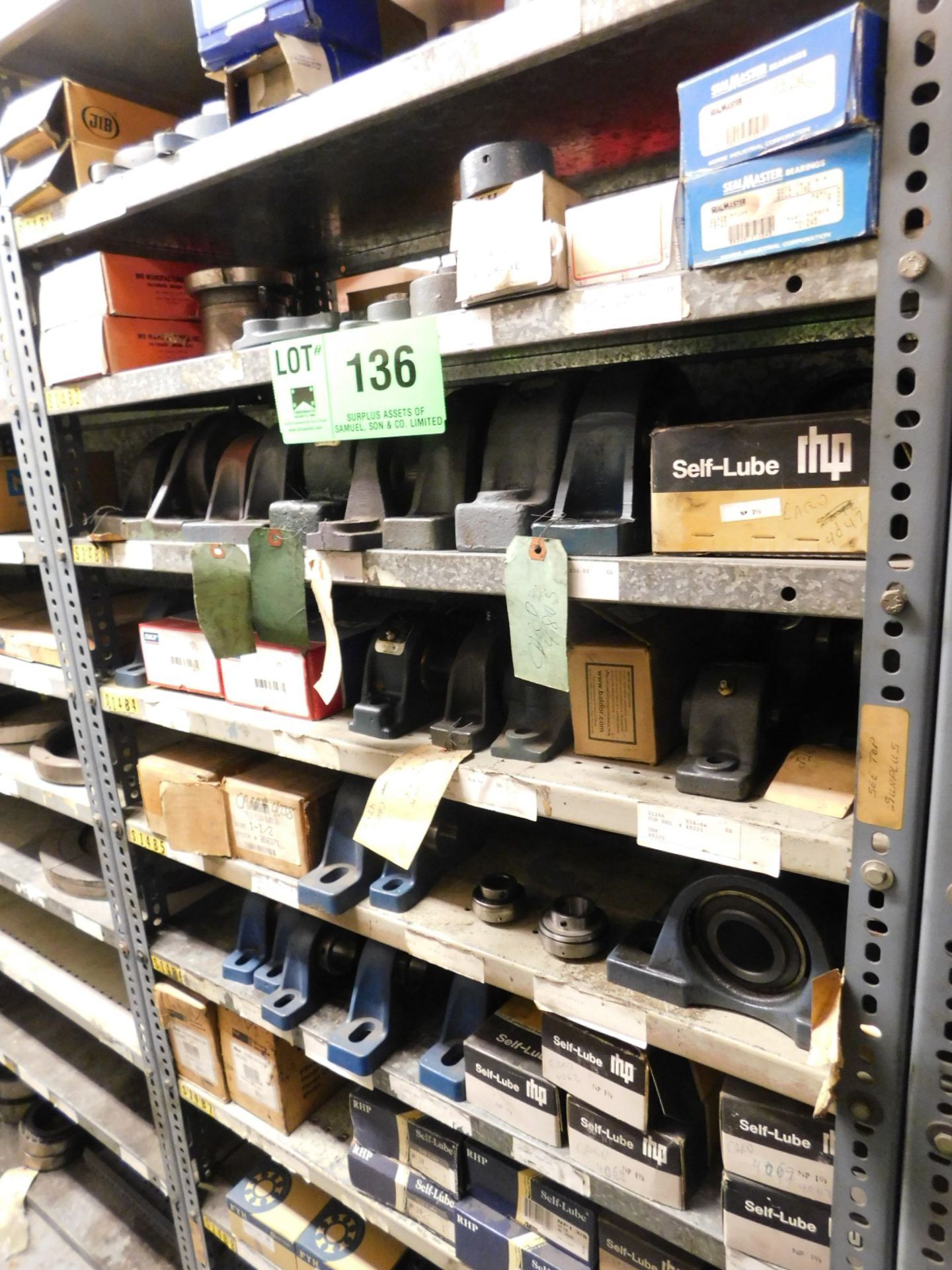 LOT/ CONTENTS OF SHELF UNIT WITH PILLOW BLOCK BEARINGS