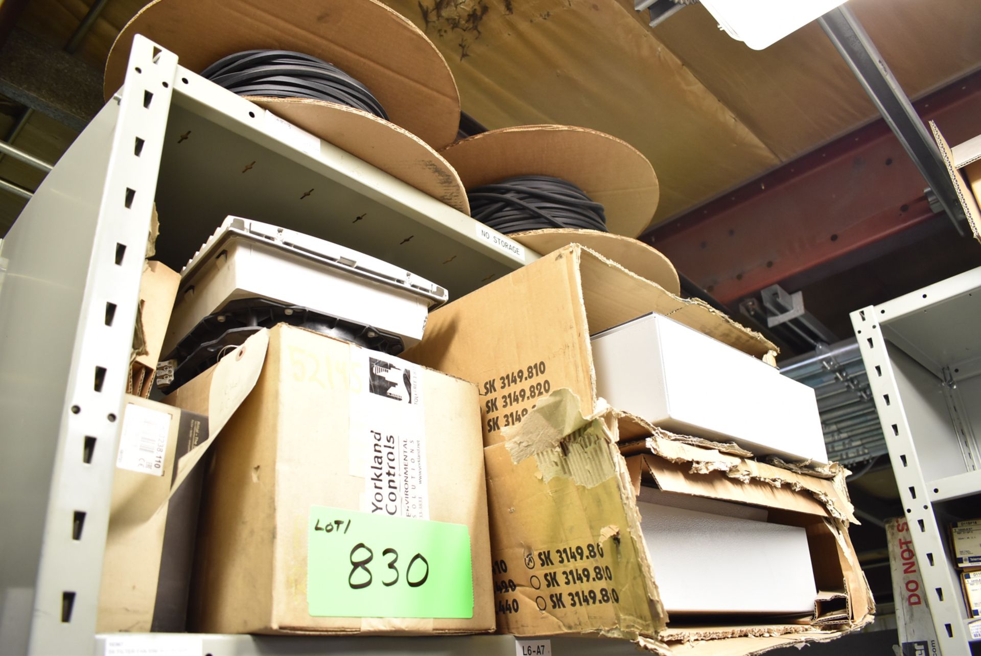 LOT/ CONTENTS OF SHELF INCLUDING ELECTRICAL BOXES, HOUSINGS, SEALS, SPARE PARTS & MROs