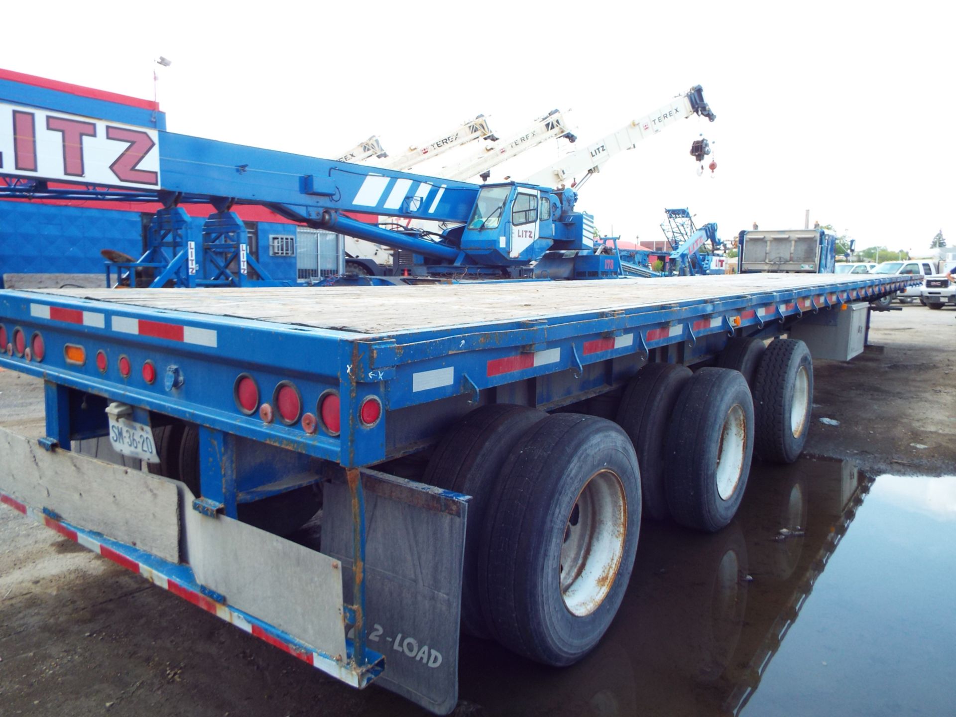 TRANSCRAFT (1986) MODEL ETH45-75 TRI AXLE FLATBED TRAILER, GVWR 70000LBS, 53' LONG, 8' WIDE, AIR - Image 4 of 5