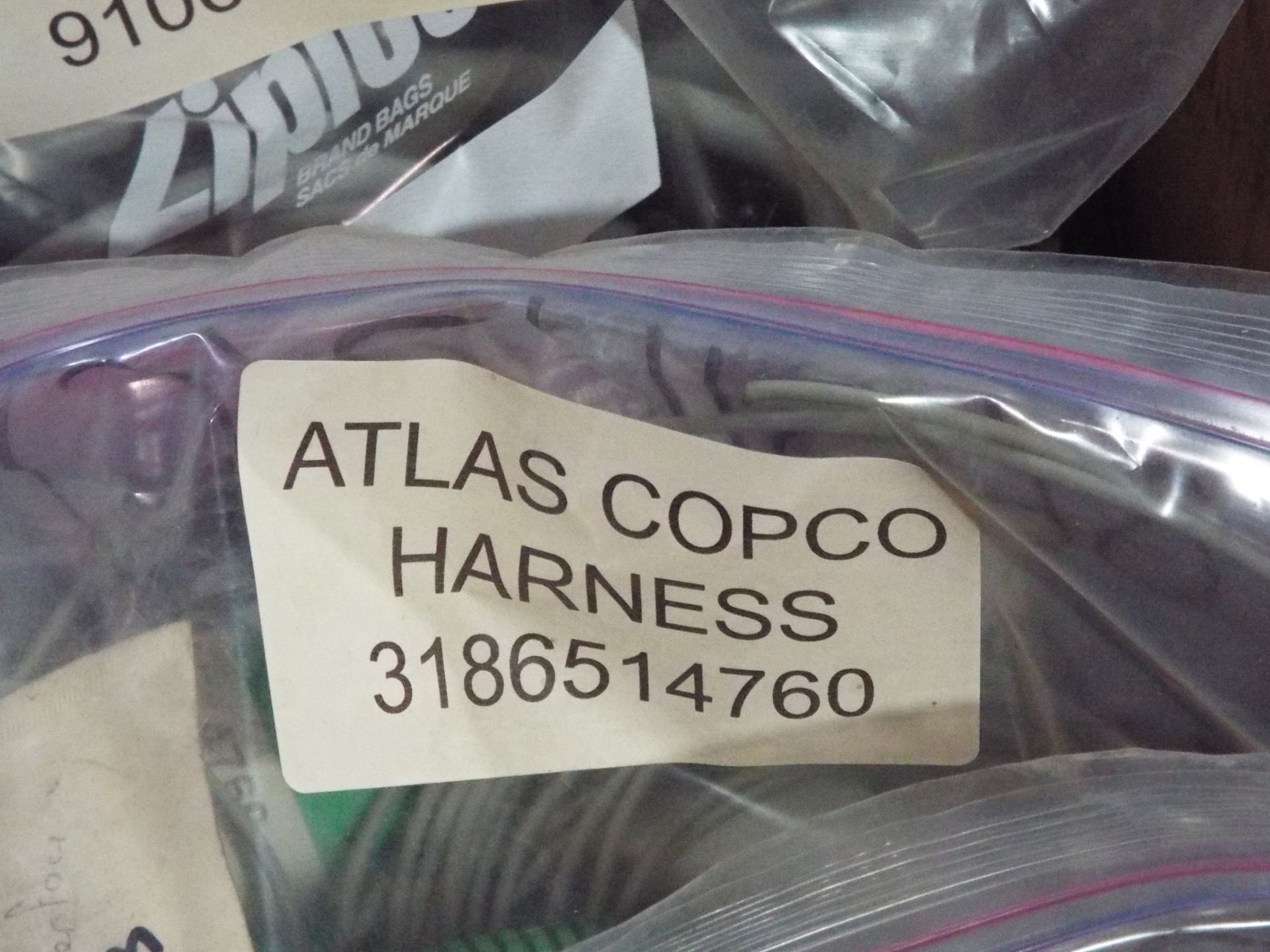 LOT/ ATLAS COPCO PARTS INCLUDING BUSHING STEEL, CONE, BAT CABLE, AND OTHER CABLES/HARNESSES - Image 15 of 16