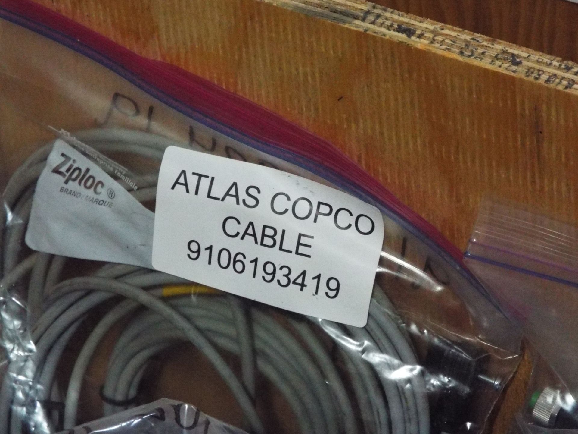 LOT/ ATLAS COPCO PARTS INCLUDING BUSHING STEEL, CONE, BAT CABLE, AND OTHER CABLES/HARNESSES - Image 12 of 16