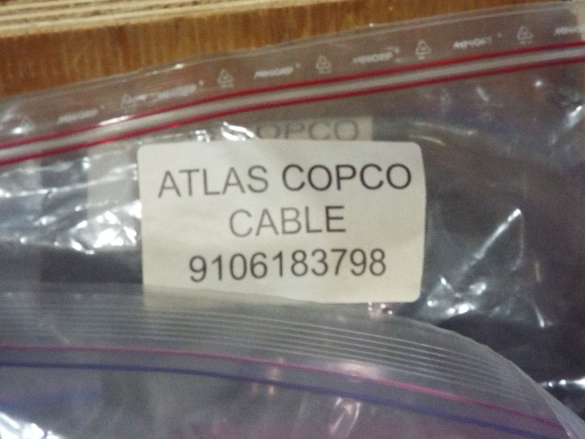LOT/ ATLAS COPCO PARTS INCLUDING BUSHING STEEL, CONE, BAT CABLE, AND OTHER CABLES/HARNESSES - Image 14 of 16