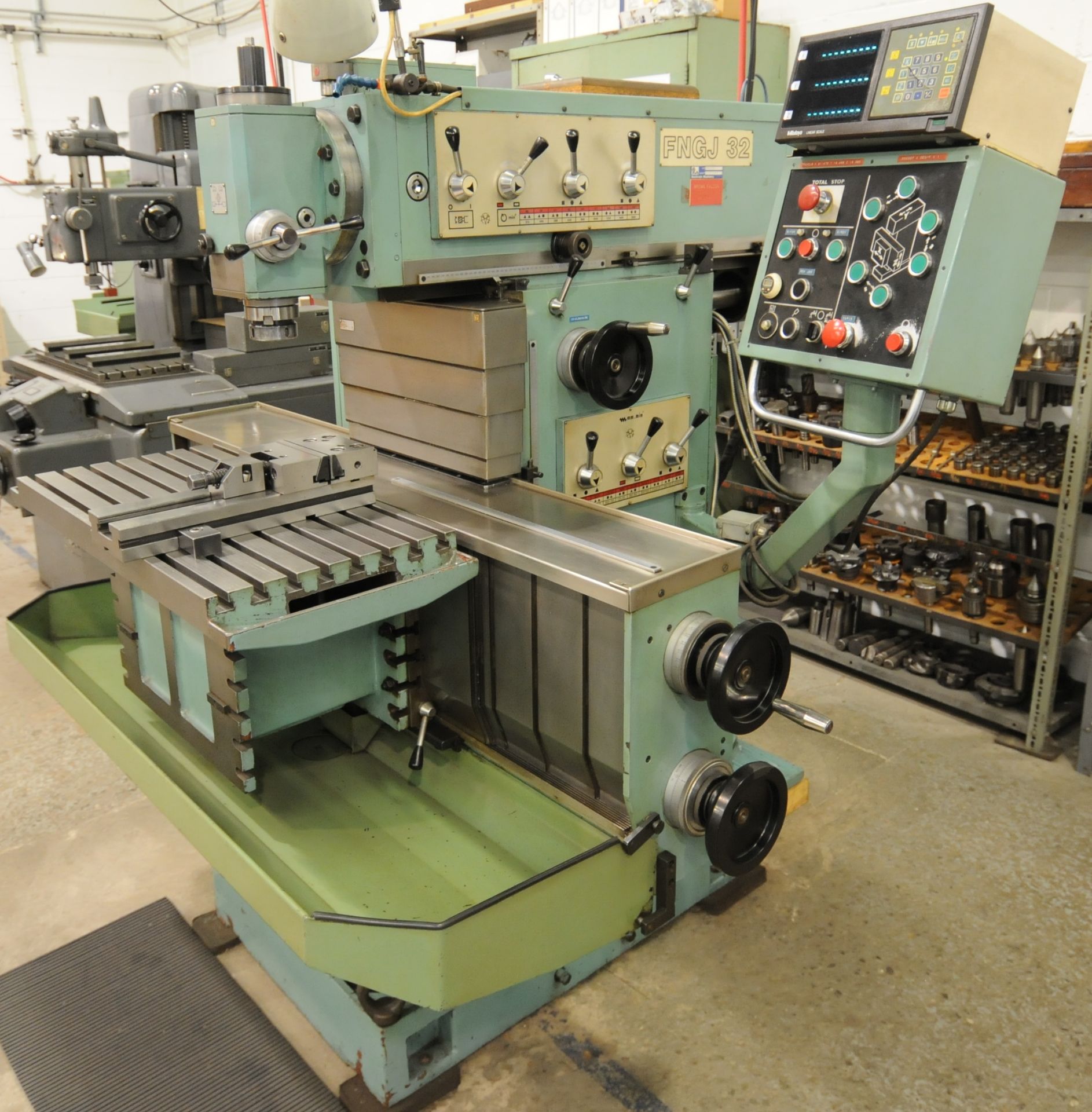 TOS FNGJ32 UNIVERSAL MILLING MACHINE WITH SPEEDS TO 2000 RPM, 32" X16" T-SLOT TABLE AND MITUTOYO 3