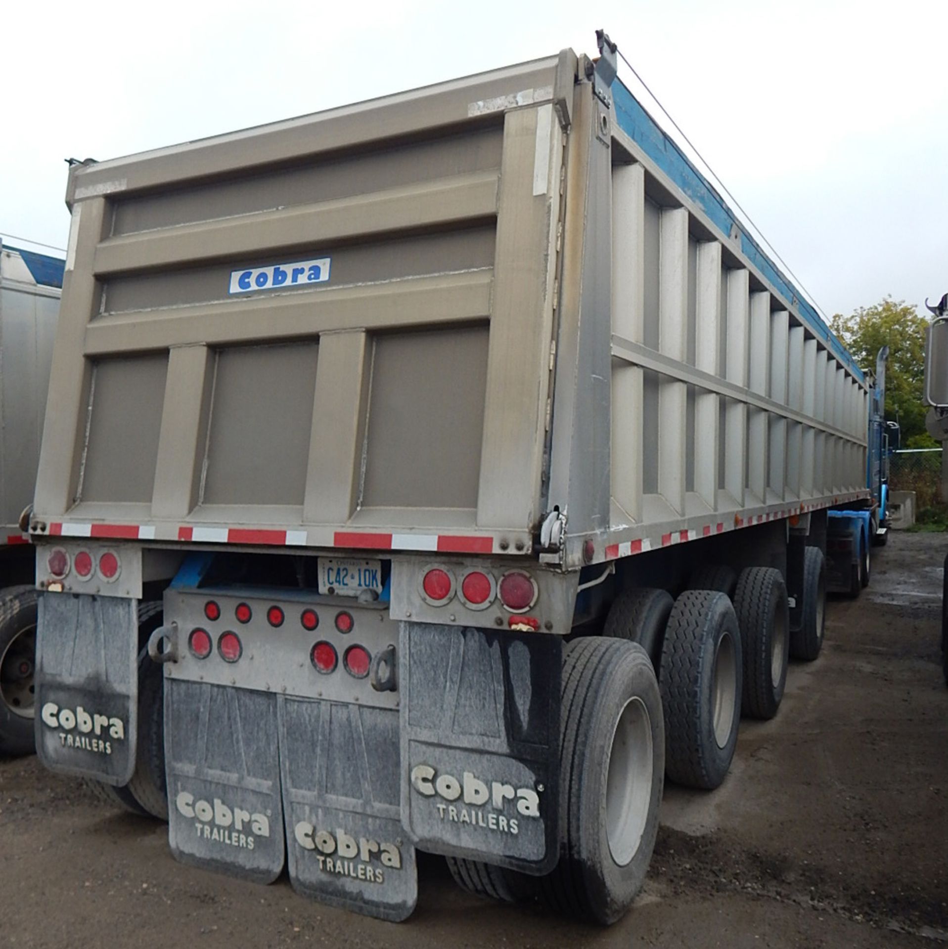 { Choice of lots: 12, 13, 14, 15 } COBRA (2006) QUAD-AXLE ALUMINUM END