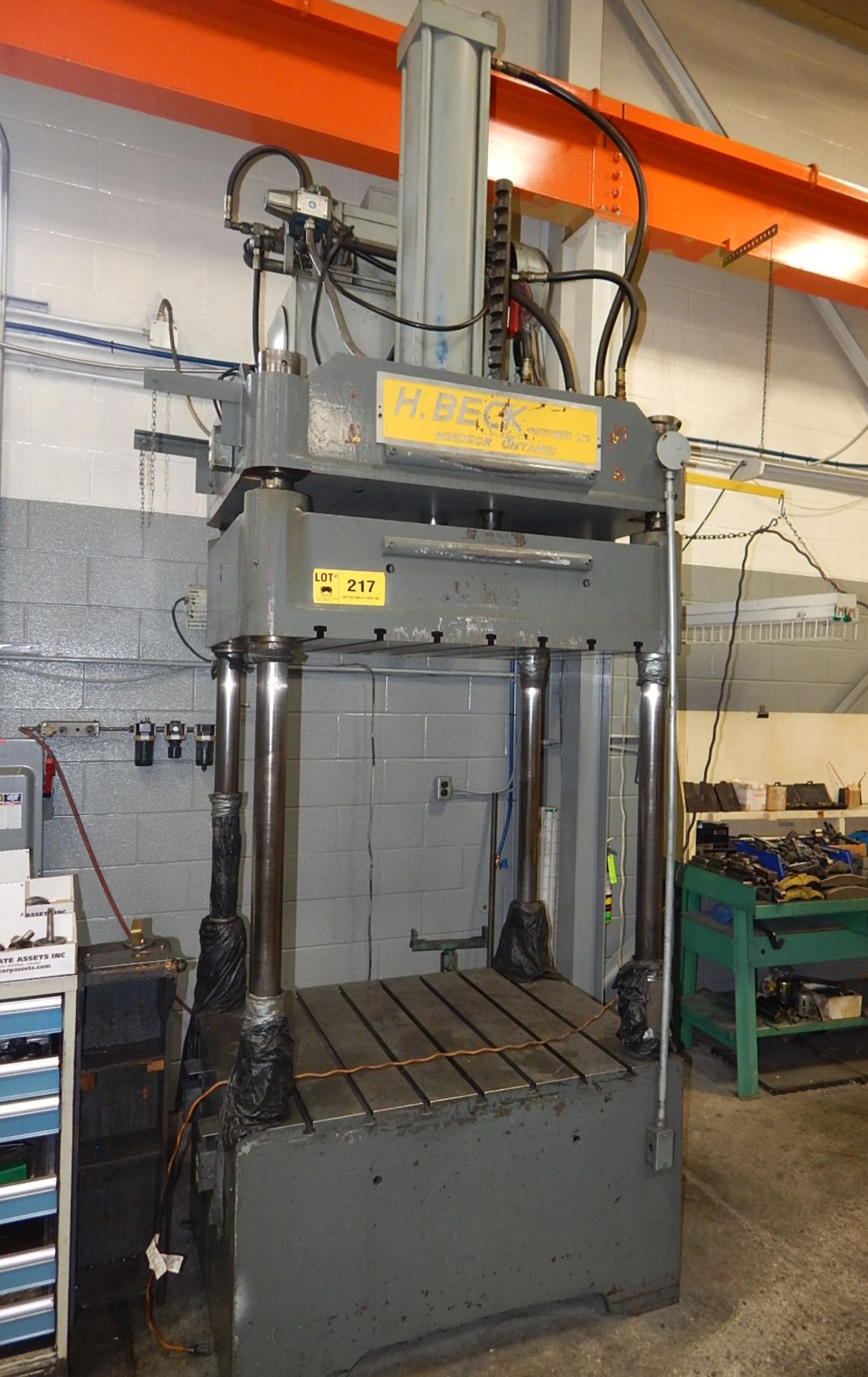 H. BECK SP50 4 POST HYDRAULIC SPOTTING PRESS WITH 50 TON CAP., 50"X39.5" PLATENS, 40"X30" WORK AREA,