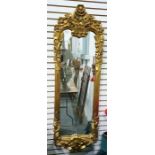 Georgian style rectangular wall mirror with heavy foliate gilt frame, the plate 95cm x 30cm