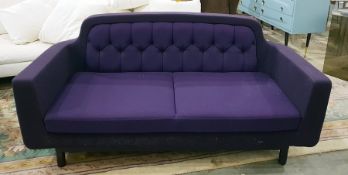 Three-seat settee of modern design, upholstered in a purple buttoned fabric