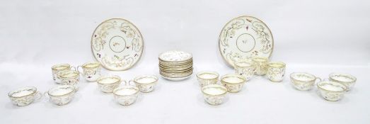 Part tea and coffee service decorated on a white ground with fruit and insects in gilt decoration