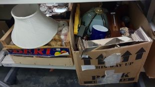 Two boxes of miscellaneous household items to include children's stuffed toys, candlesticks, baromet
